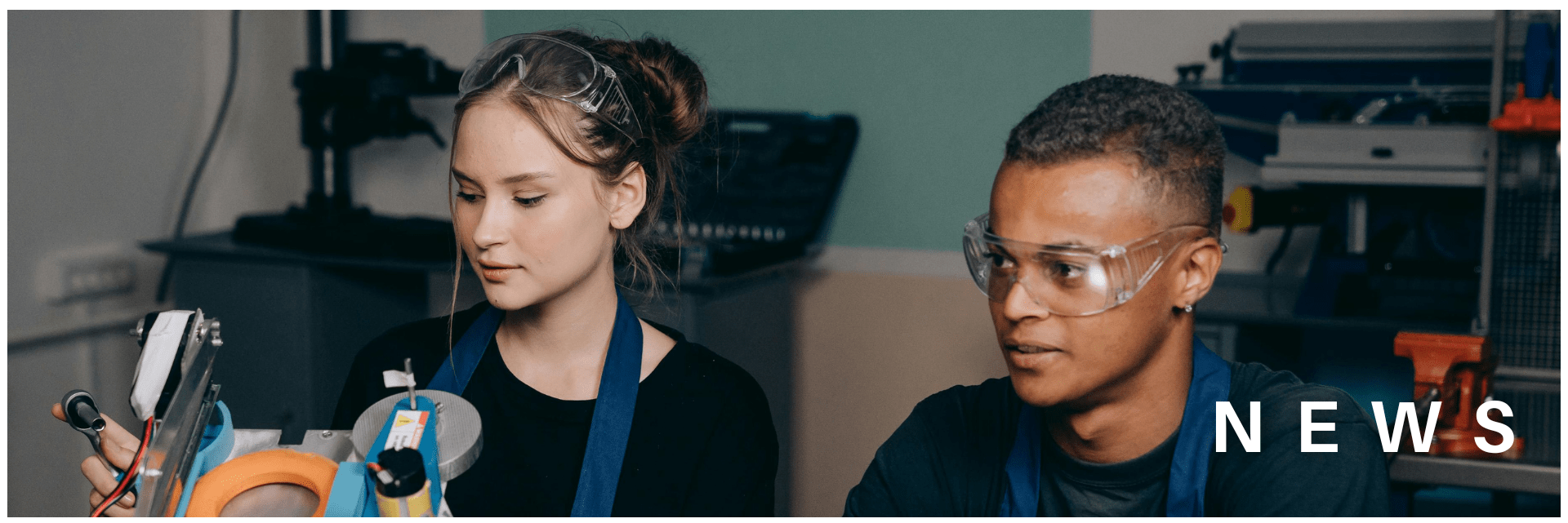 Two young people in protective goggles