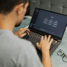 Person working on a laptop with chatGPT