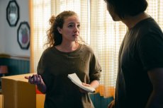 Couple fighting between moving boxes