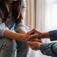 Couple holding hands 