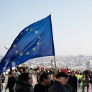 An EU Flag is waved at an demonstration