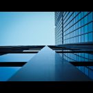 Skyscraper building, seen at an angle looking at clear sky