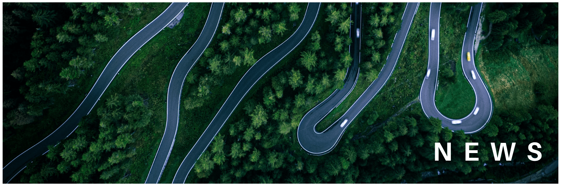 Winding road in a forest area, seen from above